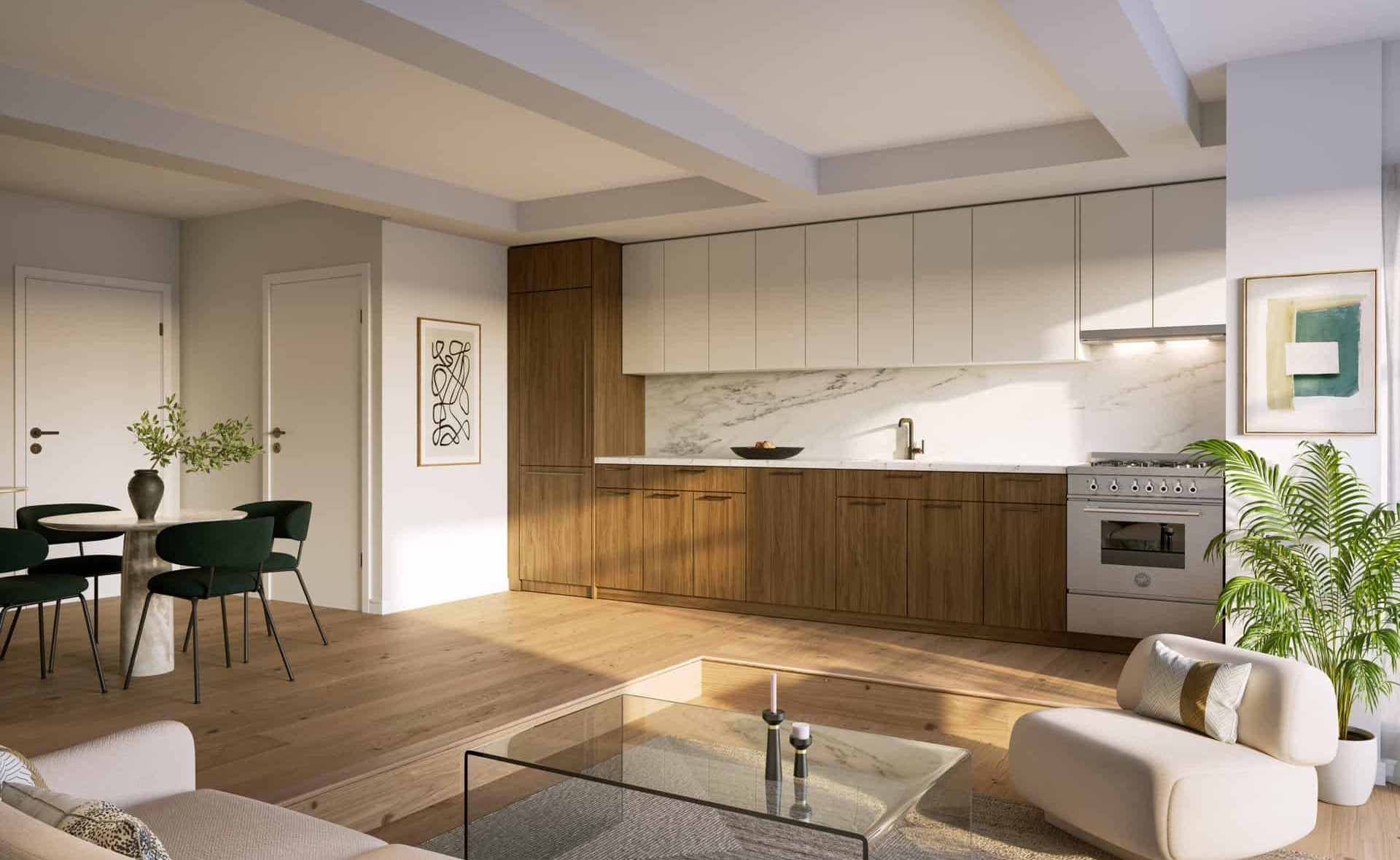 Kitchen at 340 East 52nd Street apartments with stone countertops, stainless steel range, and hardwood floors.